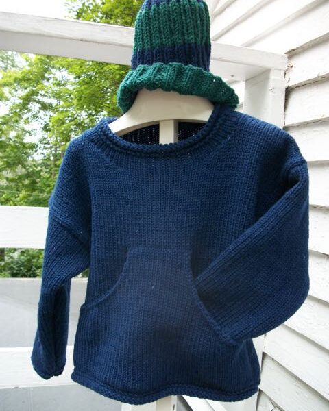 Wool rolled neck pullover with pouch pocket